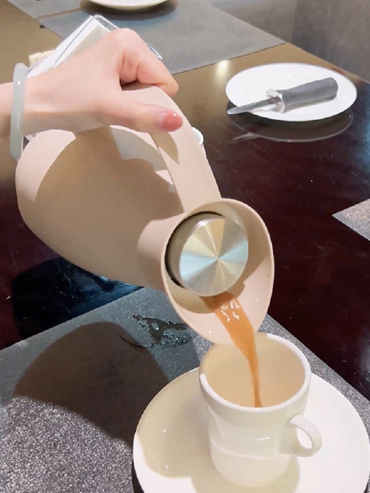 Vacuum-insulated flask with a  - Vacuum Insulated Flask reseña y precio